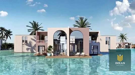Town (Water Chalet) Doreen for sale, finished with air conditioning, lagoons from all sides, with a view of the sea in Ojamy for the Swik Company Sodic in Ras Al-Hekma, installment over 8 years