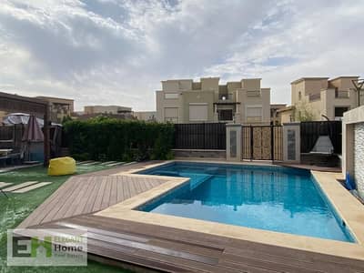 Twin house for sale in Mivida with private pool