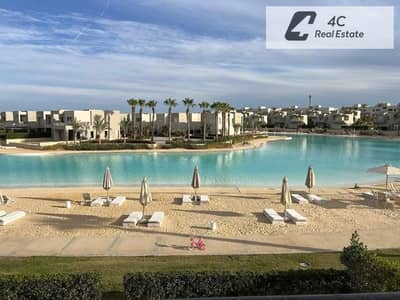 باقل توتال تاون هاوس  تشطيب كامل ريسيلDirect Lagoon View First Row في أزها الساحل الشمالي بتقسيمه مميزة بمقدم و تكمله اقساط بدون فوايد prime location