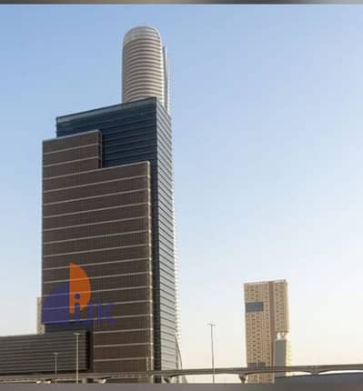 مكتب إدارى للبيع متشطب تشطيب كامل فيو برج ايقونى صريح ومحور بن زايد الشمالى New Administrative Capital