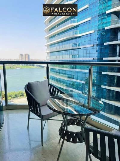 The last hotel hall + high end finishing with air conditioners for sale in Hilton Maadi, Nile view from a balcony, in installments due to a p