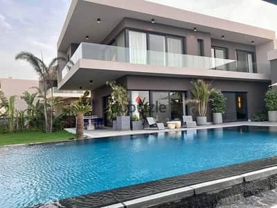 Villa for sale in Swan Lake compound, next to Palm Parks compound, on the Dahshur Link Road