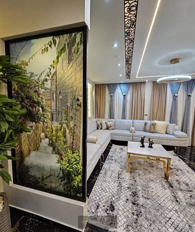 Luxury Living with a Private Garden in a Prime El Khamayel Location