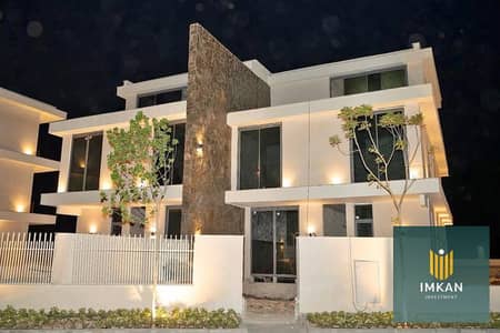 3-bedroom chalet, ready for immediate occupancy, fully finished with air conditioning, in Sodic John Ras El Hekma, close to the sea, with a lagoon vie