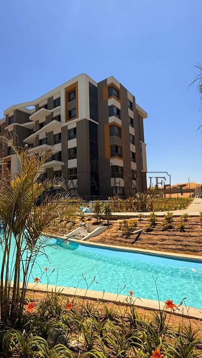 شقه متشطبه تطل علي الاجون في بالم هيلز نيو كايرو Palm Hills New Cairo استلام 2027 مع اقساط في مرحله كليو Cleo