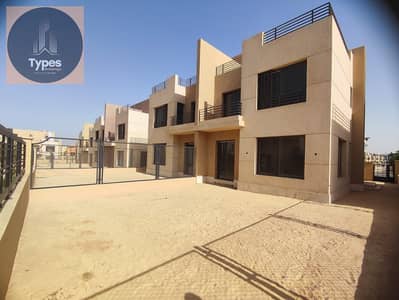 Twin house for sale, a steal at the price of an apartment, in the heart of Sheikh Zayed, prime location, fully paid in installments, immediate occupan