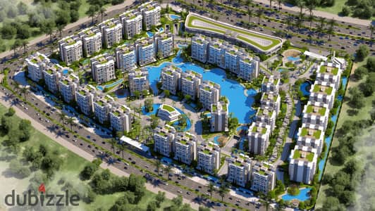 شقة للبيع بالتقسيط علي 14 سنة بمقدم 10%  بفيو مفتوح علي اكبر water features بجوار المنطقة الخدمية المركزية ودقايق من الحي الدبلوماسي