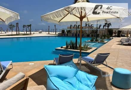 للبيع باقل من سعر الشركه- شاليه –كورنر- ريسيل –في Sea Shore Hyde Park – الساحل الشمالي -open view landscape-lagoon view-بتقسيمه مميزة-جاهز للمعاينه