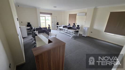 Apartment for administrative rent    In the 7th District, Sheikh Zayed    First floor with balcony