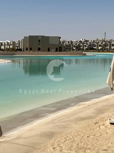 شاليه متشطب بالكامل باطلاله كامله علي البحر بموقع متميز في  Azha راس الحكمه مع امكانيه التقسيط حتي 10 سنوات