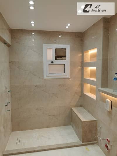 A unique opportunity: a 165m² resale apartment with special finishing in Mountain View iCity, priced inclusive of maintenance, garage, and club member