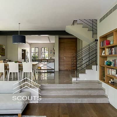Quadro Villa for sale in best location in New Cairo fully finished ultra-modern high-end distinctive view of the water features near hyde park