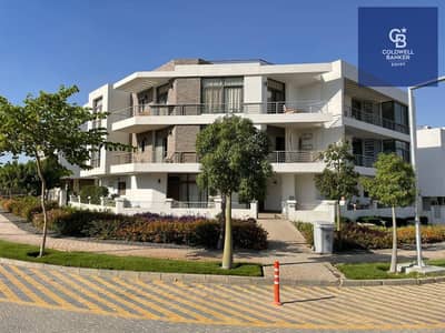 Ground floor apartment with a prime garden view in Taj City, opposite the Police Academy, available for purchase in installments over 12 years.