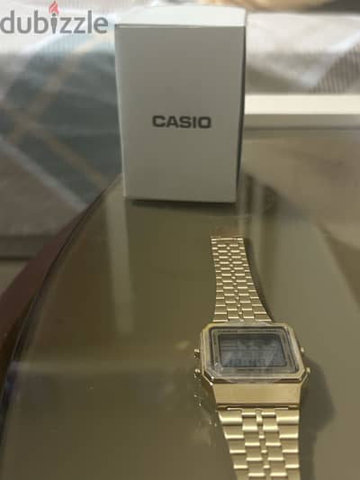 Gold Casio watch world time original