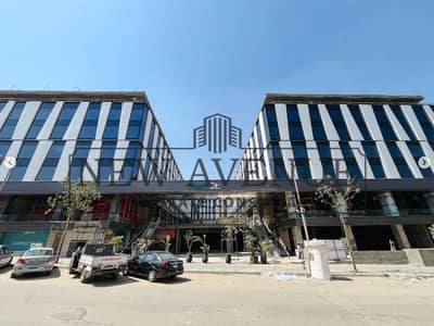 4000 SQM for rent at park street new cairo direct on ring road