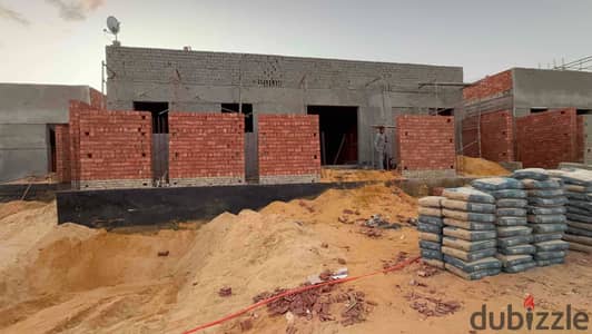 Factory for sale under construction 570 meters of land in the industrial area in Al Tagamo