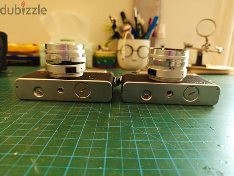 2 Yashica cameras (non-working) + case + strap 3