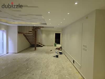 Dublex Altramodern the first residence in the violet Villas in the fifth settlement steps to ninety and Watrawi Street and Muhammad Naguib Axis