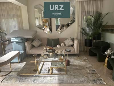 Luxury townhouse villa with a pool available for sale with a 15 year payment plan. Prime location directly on the Suez Road near La Vista City Mountai