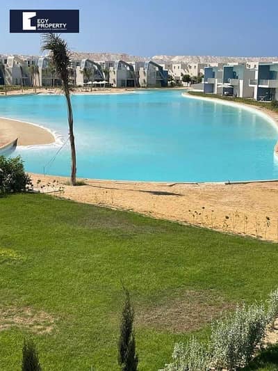 شالية بحري بالكامل للبيع في فوكا باي الساحل الشمالي بتشطيبات خاصة  على اللاجون مباشرة