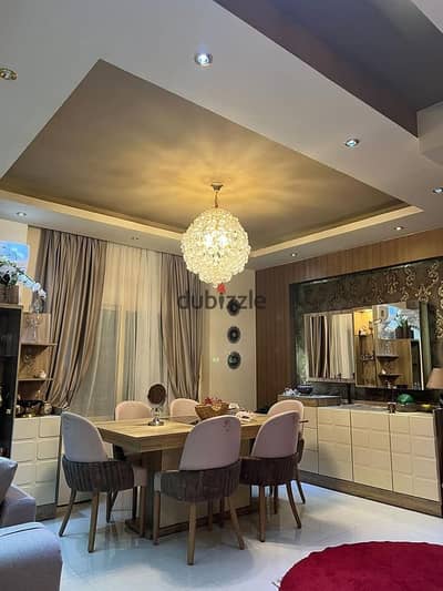 apartment with double view on landscape and swimming pool in the heart of 5th Settlement next to Hyde Park and 2 minutes from the American University