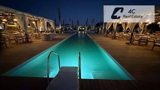 باقل من سعر الماركت  شاليه  تشطيب كامل ريسيل في Hacienda West Palm Hills بتقسيمه مميزة شامل الصيانه جاهز للمعاينه