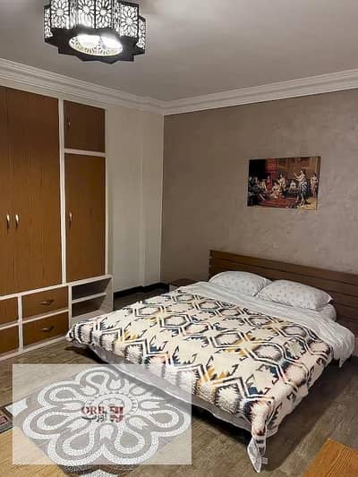 Townhouse for sale with an area of 210 sqm + 193 sqm land, in Mountain View 1.1 New Cairo, prime location facing Al Nayeb, with immediate delivery. o
