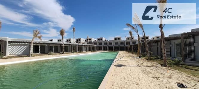 باقل من سعر الشركه شاليه ريسيل 3 غرف Hacienda West Palm Hills الساحل الشمالي prime location بتقسيمه مميزة جاهز للمعاينه