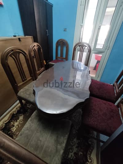 غرفه سفره مكونه من بوفيه كبير + طرابيزه سفره بعدد 7 كراسى بحاله جيده