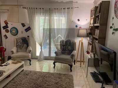 Furnished apartment for sale in Hadayek El Mohandeseen compound, Sheikh Zayed, overlooking the largest landscaped area, at a bargain price.