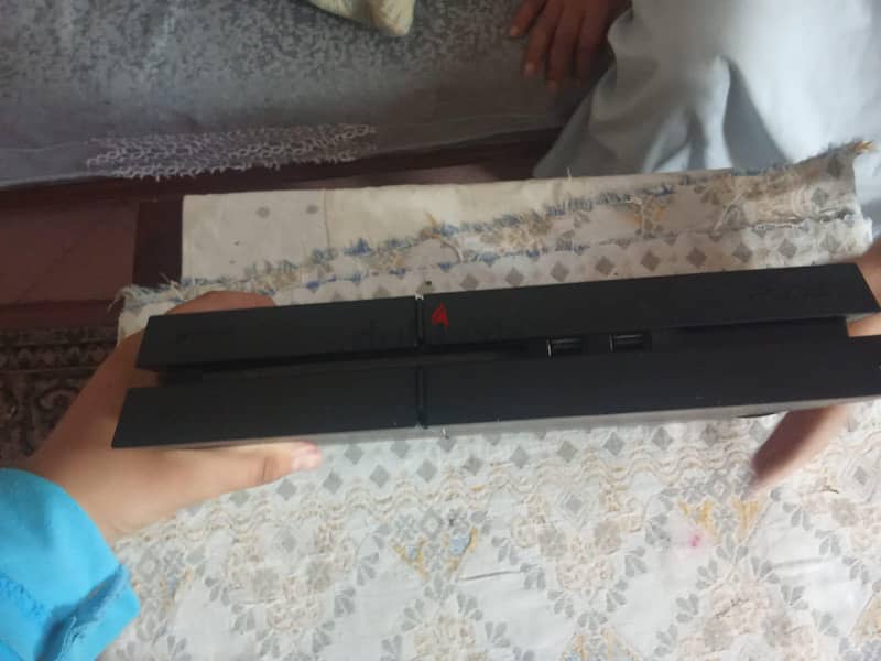 ps4 slim slightly used 1
