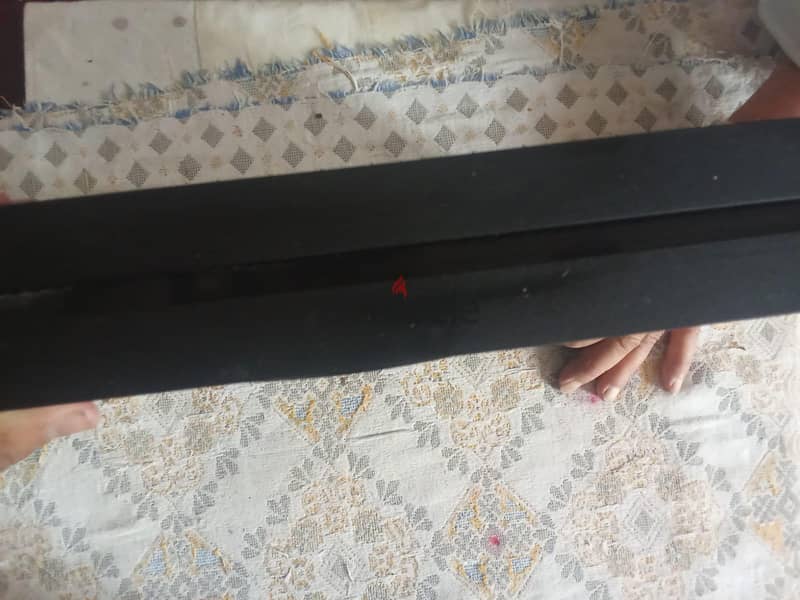 ps4 slim slightly used 2