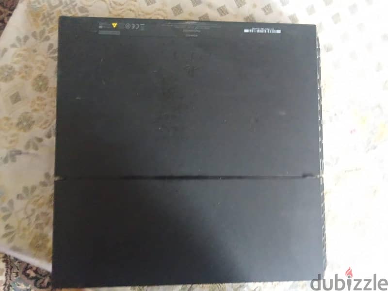 ps4 slim slightly used 3