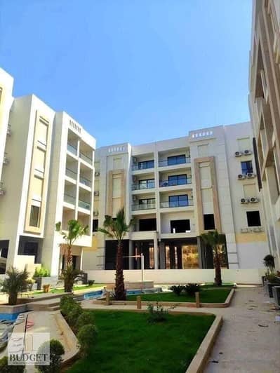 Apartment for sale, fully finished with air conditioning and kitchen, in a prime location in Al-Gar Al-Shorouk, minutes from New Heliopolis, at a spec