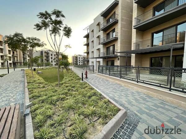 Ground floor apartment with garden for sale, ready to move, in Beverly Hills, Sheikh Zayed