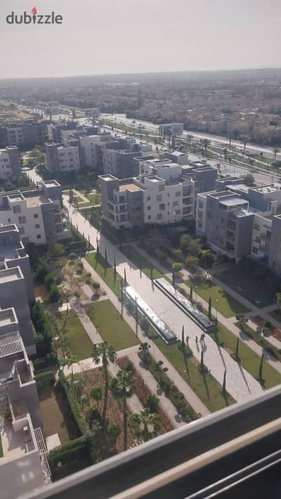 A great apartment for sale in Aeon Tower, fully finished, with a very special view, next to Mall of Arabia and Arkan.