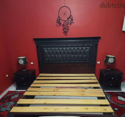 A large bed, two bedside tables and mirror for sale!