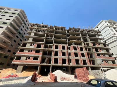 Shop in True Gate Nasr City From 21sqm, prime location, high footfall, modern design, full services, parking & 24/7 security, DP 500K, up to 6 yrs