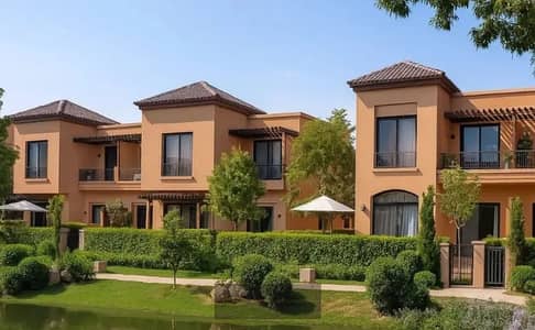 Villa for sale in Village West Sheikh Zayed at a special price with an open view of the landscape