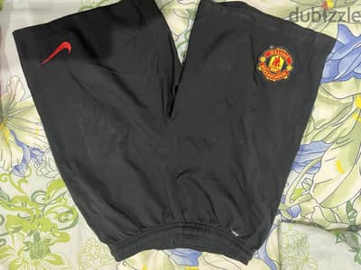 Manchester United Home and away t shirts + shorts