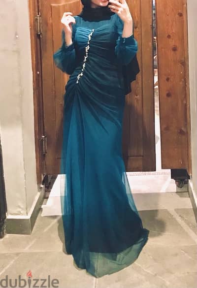 Teal dress with silver colored blings