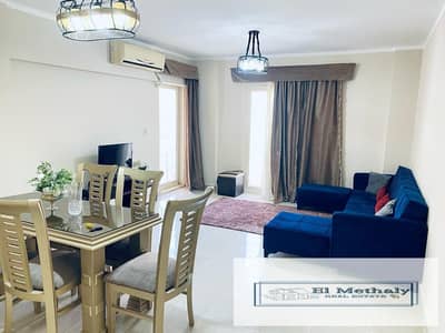 Apartment for sale with furniture and appliances in New Cairo, Al-Rehab City, Phase Eight, in a prime location in front of the Eastern Market