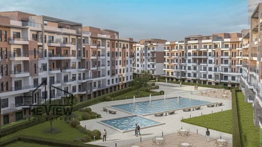شقة أرضي بجاردن  (Mini Villa Style)  مميزه للبيع بتصميم فيلا مستقلة في قلب كمبوند فيوري FIORI compound موقع استراتيجي  اقل من  15دقيقه للحصري