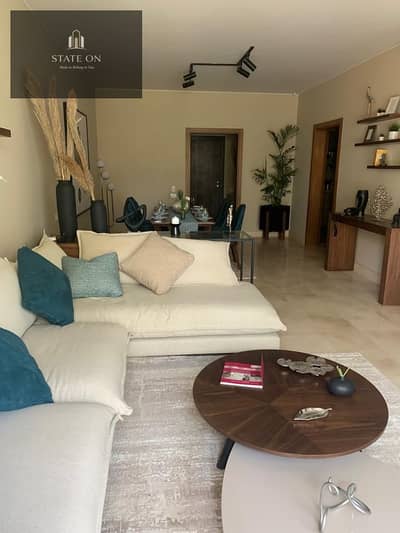 Ground floor apartment with a garden in a prime location near the American University in New Cairo, with a great discount in The Icon compound.