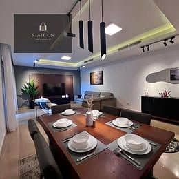 Ground floor apartment with a garden, prime location near the American University in New Cairo, with a great discount in Rock Vera compound.