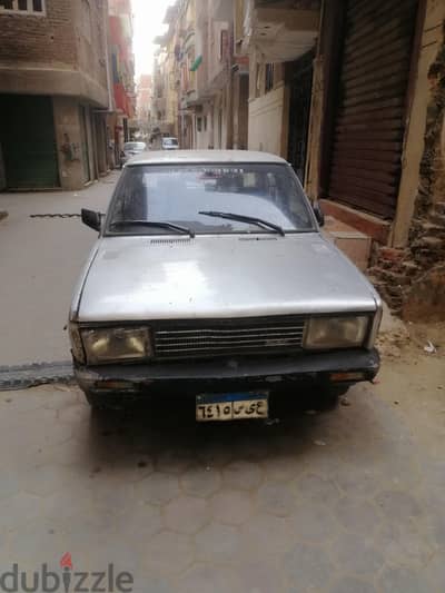 سياره ١٣١ لون رصاصي