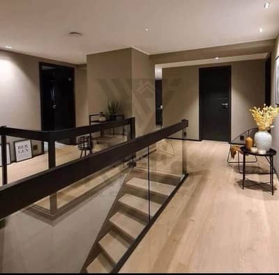 Villa for sale with a private garden at the initial offering price, with a down payment of only 980,000 and installments over 12 years, in the most di