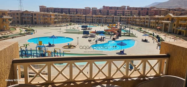 شاليه للبيع في كاريبيان باي بورتو السخنة | إطلالة مباشرة على حمامات السباحة