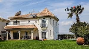 Villa for sale in the heart of New Cairo, in a prime location. The villa overlooks a fully landscaped area with a very distinctive layout.