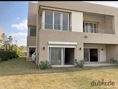Twinhouse villa overlooking a green space in The Crown Palm Hills near Golf Views , New Giza , Swan Lake